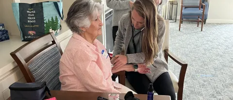 Students perform health screenings for older adults at Bessey Crossing