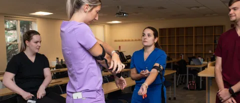 PA students try to place tourniquets on themselves