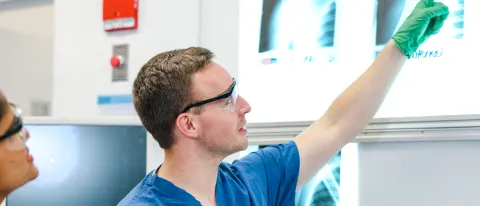 Students evaluate x-rays in the human body donor lab