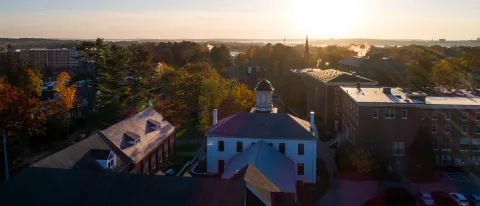 Drone image of Portland Campus and surrounding area at sunset