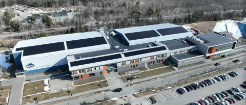 A solar array is shown on the roof of the Harold Alfond Forum in Biddeford