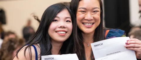 Two female students celebrate their residency matches