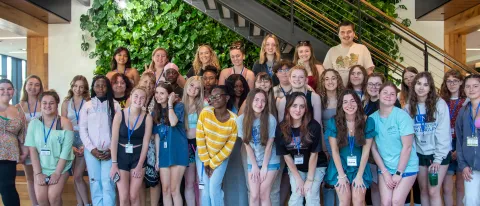 A group of high school students poses for a photo