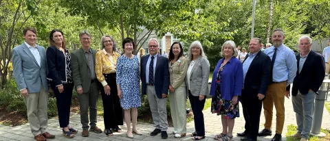 A group of Maine biomedical researchers poses with Sen. Susan Collins