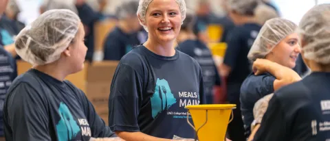 Meals for Maine volunteers prepare meal kits on Sept. 18 to help combat food insecurity.