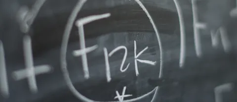 A chalkboard with mathematical equations