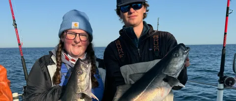 Amelia Burbidge and Evan Kamoen fish off the coast of Maine. 