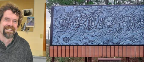 A composite image including a headshot UNE's Stephen Burt and a painting of Burt's displayed on a highway billboard