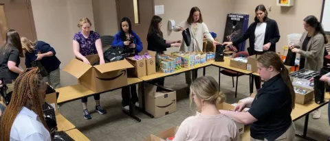 Students assemble harm reduction kits at the Cumberland County Jail