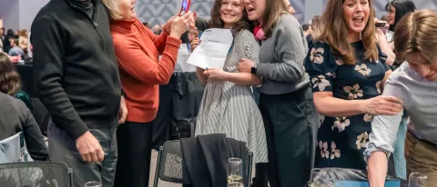 A medical student celebrates match results with her family