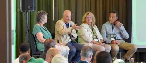 UNE's Norm O'Reilly speaks as part of a panel of sports industry experts 