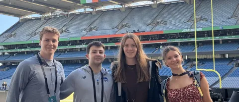 Four UNE students worked at NFL game in Ireland.