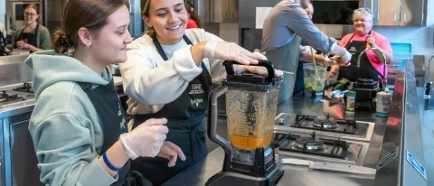 UNE occupational therapy students perform an exercise preparing blended foods for patients with limited swallowing capabilities