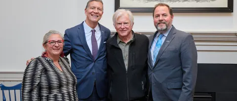 UNE's Gwen Mahon, James Herbert, and Jim Irwin with David Shaw