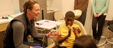 A pediatric patient receives dental care