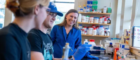 Eva Rose Balog with students in her lab