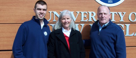 Nathan Oakes with Doug and Susan Biggs
