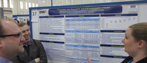Matthew Lacroix, Pharm.D., assistant professor in the College of Pharmacy, Maxwell Roberts (COP, '17), Nikki Withrow (COP, '17)