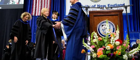 President James Herbert welcomes UNE Commencement speaker Governor Janet Mills