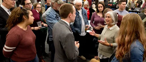 Senator Eric Brakey speaks with UNE School of Social Work Director Shelley Cohen Konrad