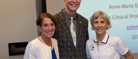 President James Herbert and Anne-Marie Davee welcome Joan Benoit-Samuelson to UNE