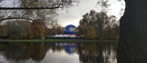 A visual display of the Earth at Rheinaue Park, where one of the two conference venues, the Bonn zone, was held. Each of the var