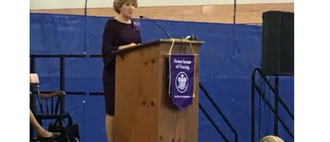 Debra Kramlich gives the keynote speech at the International Honor Society for Nurses annual induction ceremony