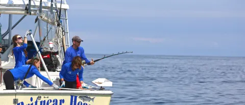 James Sulikowski and his students fish for sharks during a research expedition