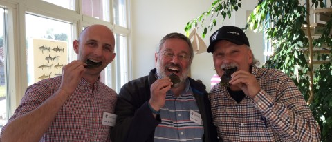 UNE's Adam St. Gelais and Barry Costa-Pierce sample sea vegetables with Thierry Chopin of the University of New Brunswick