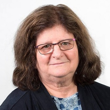 Headshot of U N E employee Carol Brenner