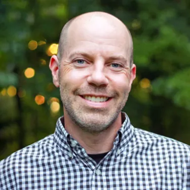 Headshot of U N E employee Bob Kennedy