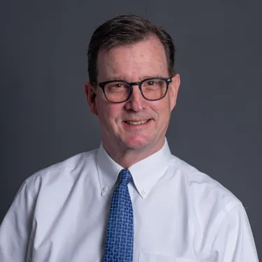 Headshot of Geoffrey McCullen