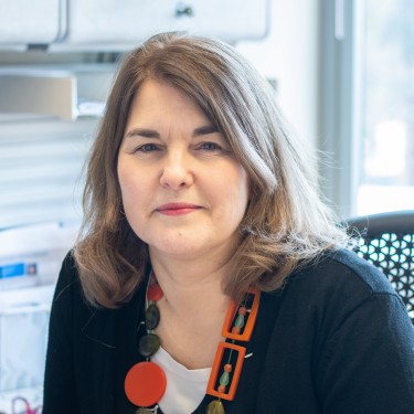 Portrait of U N E employee Karen Eck