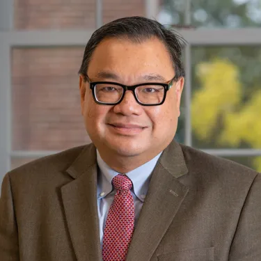 Headshot of Conrad Dhing