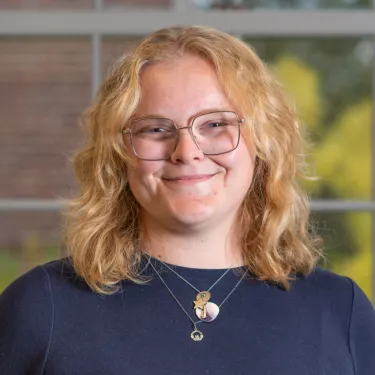 Headshot of Maggie Coen