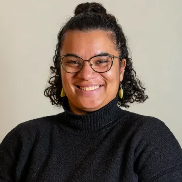 Headshot of Thea Hollman