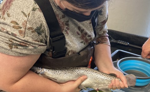 student with salmon