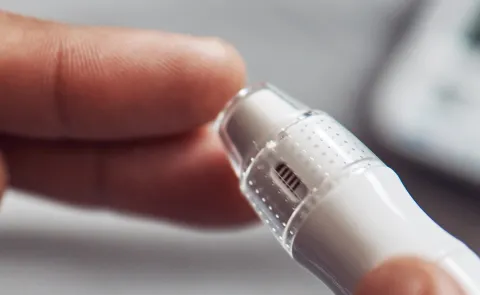 Image of a finger poke for blood sugar screening
