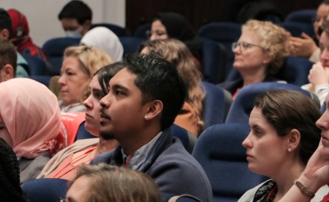 Photo of students sitting in an auditorium on the Tangier campus