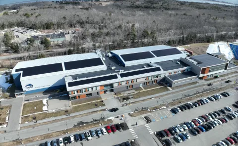 A solar array is shown on the roof of the Harold Alfond Forum in Biddeford
