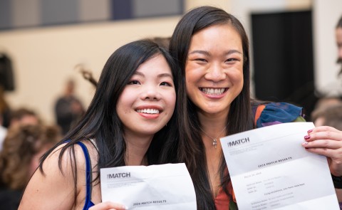 Two female students celebrate their residency matches