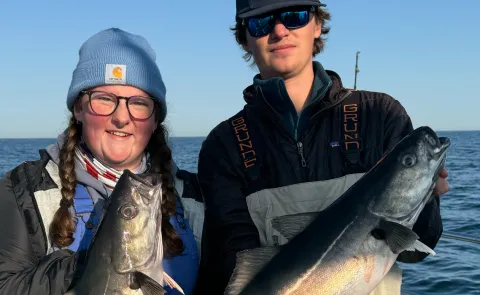 Amelia Burbidge and Evan Kamoen fish off the coast of Maine. 