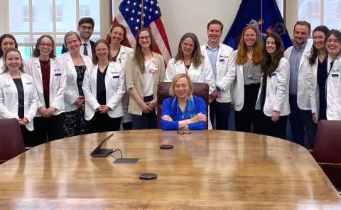 UNE medical students and administration pose with Maine Gov. Janet Mills