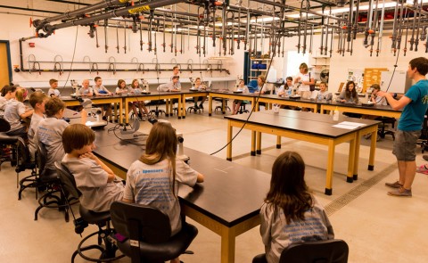 RSU 21 students are led in a lab activity at last year's Julia Robinson Math Festival, held on UNE's Biddeford Campus.