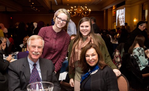 Senator Angus KIng and UNE President Danielle Ripich with students Halie Pruitt (left) and Sarah Schilke at the Maine NAACP's A