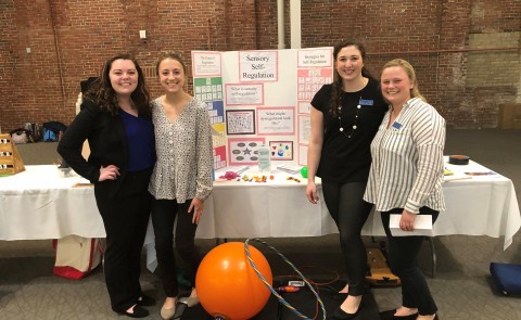OT students Christina McLaughlin, Emma Robidoux, Kassidy Towne and Hannah Reidman presented on sensory approaches at the Autism 