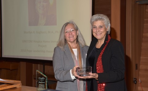 Marilyn Gugliucci accepts the Katherine Pope Leadership Award from Hospice of Southern Maine