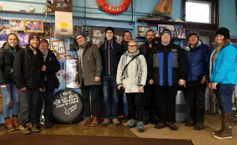 Students from five countries get ready to enjoy some Maine seafood during a break from a UNE NORTH course