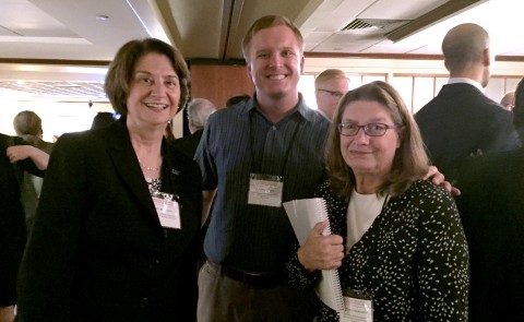 Ellen Beaulieu (left) and Margaret Moremen (right) stand with Nick Gill (colleague from York County Community College and recent