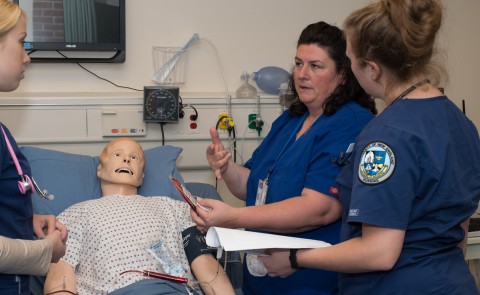 UNE Nursing students work in the Simulation Lab